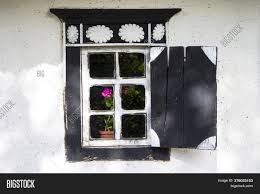 While sills are a great place to put plants, they're also a necessary part of the window, keeping out rain and making windows more energy efficient. Ancient Window Rounded Image Photo Free Trial Bigstock