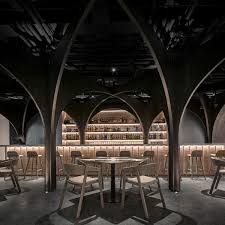 The interior design is armani minimal but quite beautiful. Somesome Bar Restaurant Mars Studio Archdaily