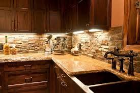 Instead of merely doing a backsplash, run tile up to the ceiling.it makes more of an impact that way. Stone Backsplash Ideas Make A Statement In Your Kitchen Interior
