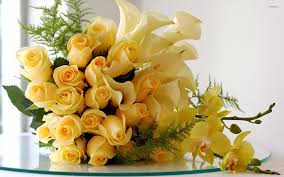 yellow roses calla lilies and orchids