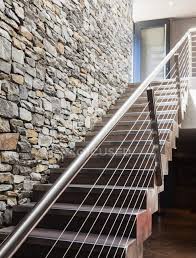 stone wall and modern staircase