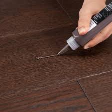 how to fill gaps in wood floor proven