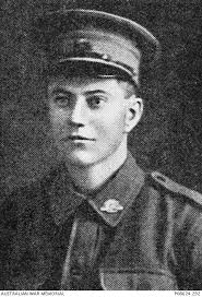 Studio portrait of 6801 Private (later Lance Corporal) Edward Marius Thomas Reboul, 13th Battalion of Strathfield, NSW. A clerk prior to enlisting, ... - P08624.292
