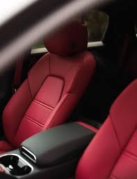 Red Interior Of A Car With The Word Bmw