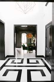 foyer with black and white greek key