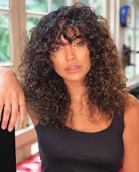 The curly look on both sides of the head makes this hairstyle looks marvelous. How To Wear Curly Hair With Bangs Human Hair Exim