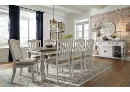 It includes a large display panel mounted on gray textured walls along with white pendants. Havalance Dining Room Table Ashley Furniture Homestore Independently Owned And Operated By Best Furn Appliances I