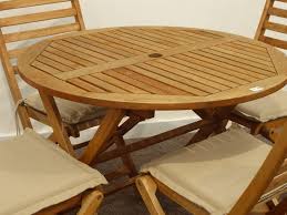 This patio table is such good value for money and with an easily operated and hassle. Hardwood Folding Circular Garden Table D90cm And Four Matching Folding Chairs With Upholstered Seat Cushions Antiques Fine Art Jewellery Interiors