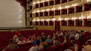 Naples Italy Teatro Di San Carlo Guided Tour Lecturing Visitors Sitting In Seats With Information About The Historical Opulent Opera House Theater