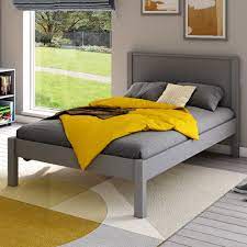 grey low end small double bed