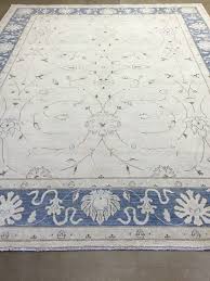 beige and light blue peshawar rug