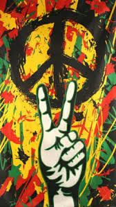 hand holding a peace sign wallpaper