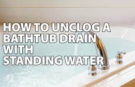 a bathtub drain with standing water