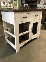 It offers top of a large usable surface, cabinets, drawers and shelves for storage. Four Portable Kitchen Islands Sized Smaller Southside Building Center