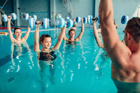 gym with swimming pool