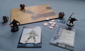 A game that is no longer in production, but still being played. Star Wars Miniatures
