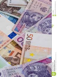 Banknotes Polish Zlotys And Euros Are On The Heap Vertical