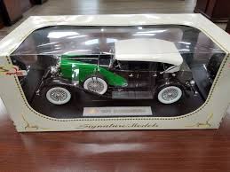 1934 duesenberg model j black green 1