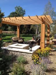 A Pergola Over A Fire Pit Traditional