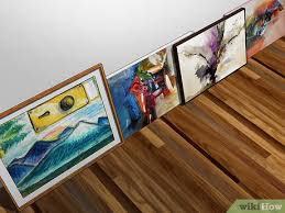 How To Arrange Artwork On A Wall With