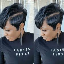 Tapered pixie cut with bangs. 25 Chic Pixie Cut Black Hair Combos We Love