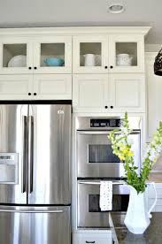 Make the metal plate under the cabinet larger than the cutting board so the board will be easy to put away. How To Add Glass Inserts Into Your Kitchen Cabinets Kitchen Cabinets Kitchen Remodel Kitchen Renovation