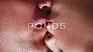 gentle kiss of man and woman on lips