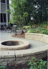 curved brick paver patio with fire pit