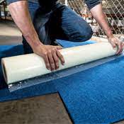 temporary carpet protection adhesive
