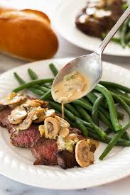 broiled steak with mustard sauce