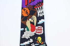 Looney tunes is a longstanding and multifaceted marketing conglomerate, all inspired by recognizable characters such as porky pig, daffy duck, and bugs bunny. Looney Tunes Jammin Taz Tasmanian Devil Space Jam Basketball Cartoon Tie Necktie Ebay