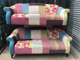 pair of funky patchwork style sofas