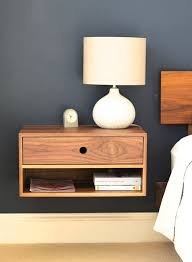 It's made from manufactured wood and there are a few color choices. Floating Nightstand With Drawer In Walnut Mid Century Modern Etsy