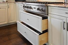 The project is about changing cabinet door. New Cabinet Refacing Ideas To Revamp Your Old Kitchen Layout