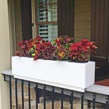 Designed to hang on the side of your deck rail, these planter boxes will completely transform the exterior of your house and become an indispensable. The 24 New Age Modern Rail Top Planter Sits Over A Railing And Can Be Used To Bring Your Garden To Your Railing Planters Deck Railing Planters Modern Railing