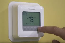 program honeywell t4 pro thermostats