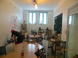 Now when buying coffee, you can read a book, and if you like it, buy it at a discount. Dining Area Next To Coffee Shop Cafe Picture Of See You In Iran Hostel Tehran Tripadvisor