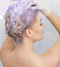 to wash your hair after coloring it