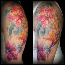 Watercolor tattoos are more delicate and fluid than traditional tattoos. Watercolor Floral Tattoo By Haylo By Haylo Tattoonow