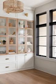 white kitchen cabinets with stained oak