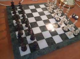 antique chess set with board marble