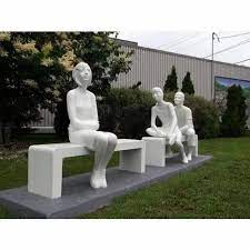 Carved White Cement Sculptures