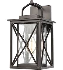 elk lighting carriage light 1 light sconce in matte black with seedy glass 46750 1