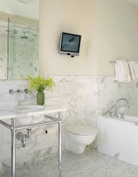 The television is easily hung on the wall. Tech Out Your Bathroom With Tv Audio And More Cozy Decor Store Blog