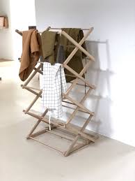 Drying racks provide a traditional solution for leaving wet clothes out to dry. Beech Wooden Clothes Drying Rack Pantoufle