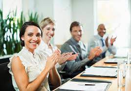 Business people clapping in meeting - Stock Image - F014/3036 - Science Photo Library