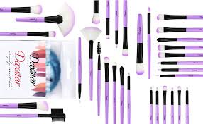 a set of 32 purple makeup brushes