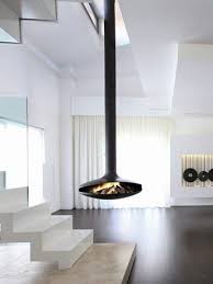 Fireplace mounted on or inserted into wall. Open Central Hanging Fireplace Gyrofocus By Focus Design Dominique Imbert 1968 Fireplace Hanging Fireplace Fireplace Design Home Fireplace