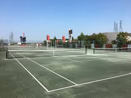 Clay courts require regular maintenance. Tennis Court Surfaces Comparing Tennis Court Playing Surfaces