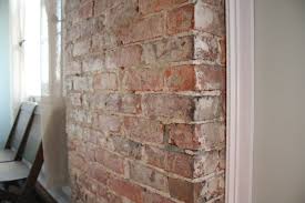 Brick Chimney Under Plaster Walls